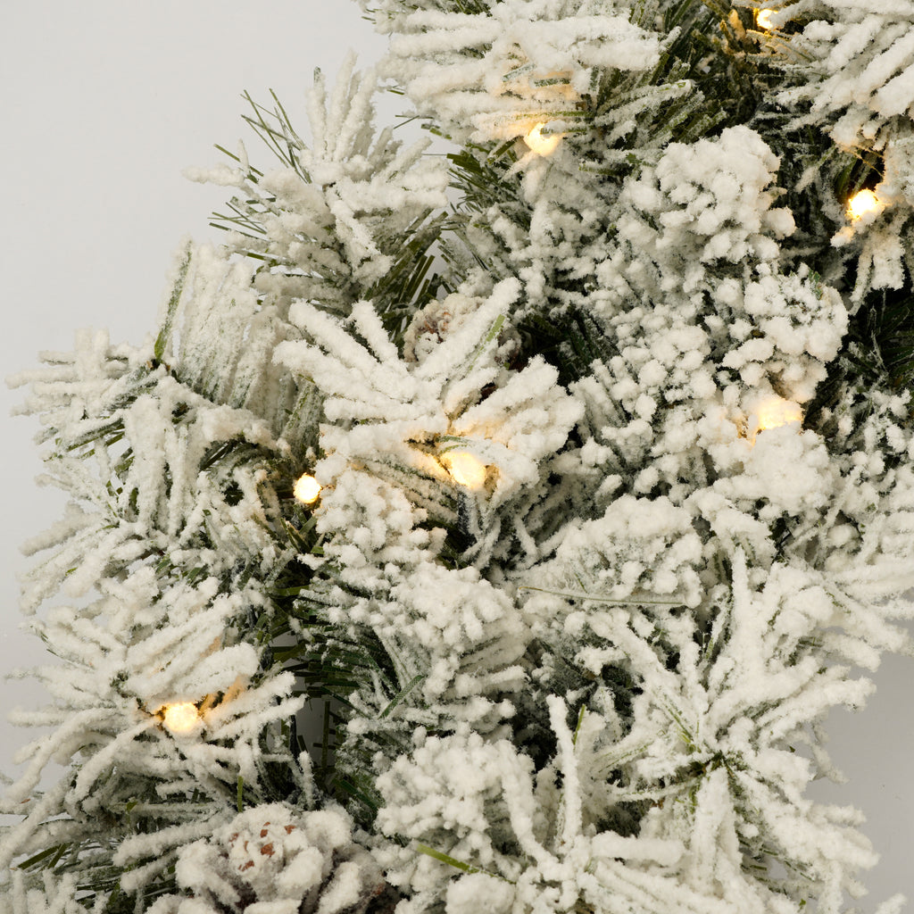 A set of 4 artificial Christmas trees, including flower garlands, flower garlands, and 2 entrance trees, with LED lights